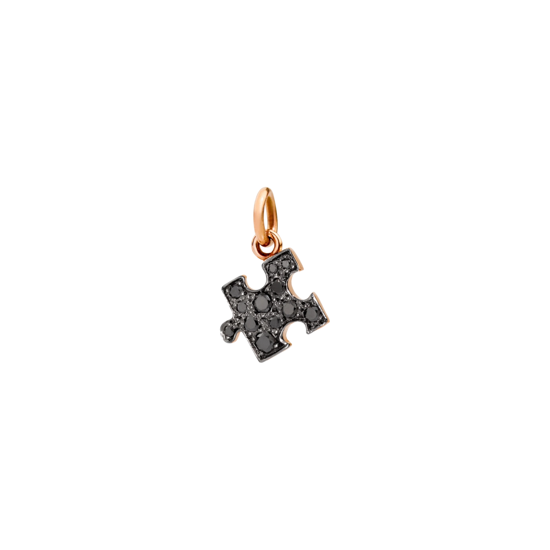 Dodo Anhänger Puzzle aus 9Karat Roségold. Das Puzzlestück ist mit 12 schwarzen Brillanten besetzt.