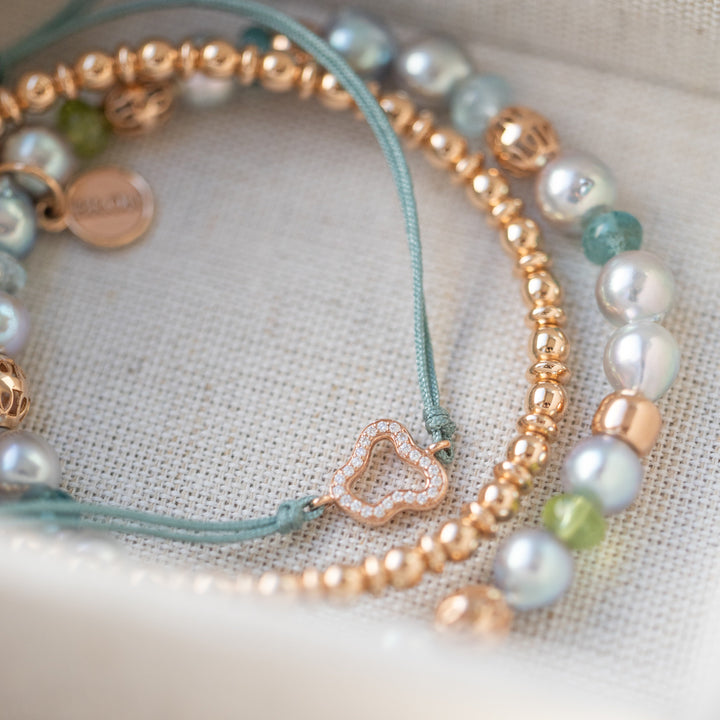 Bron Reflex Armband 7AR4049 aus Roségoldenen Kugeln und Ronden.