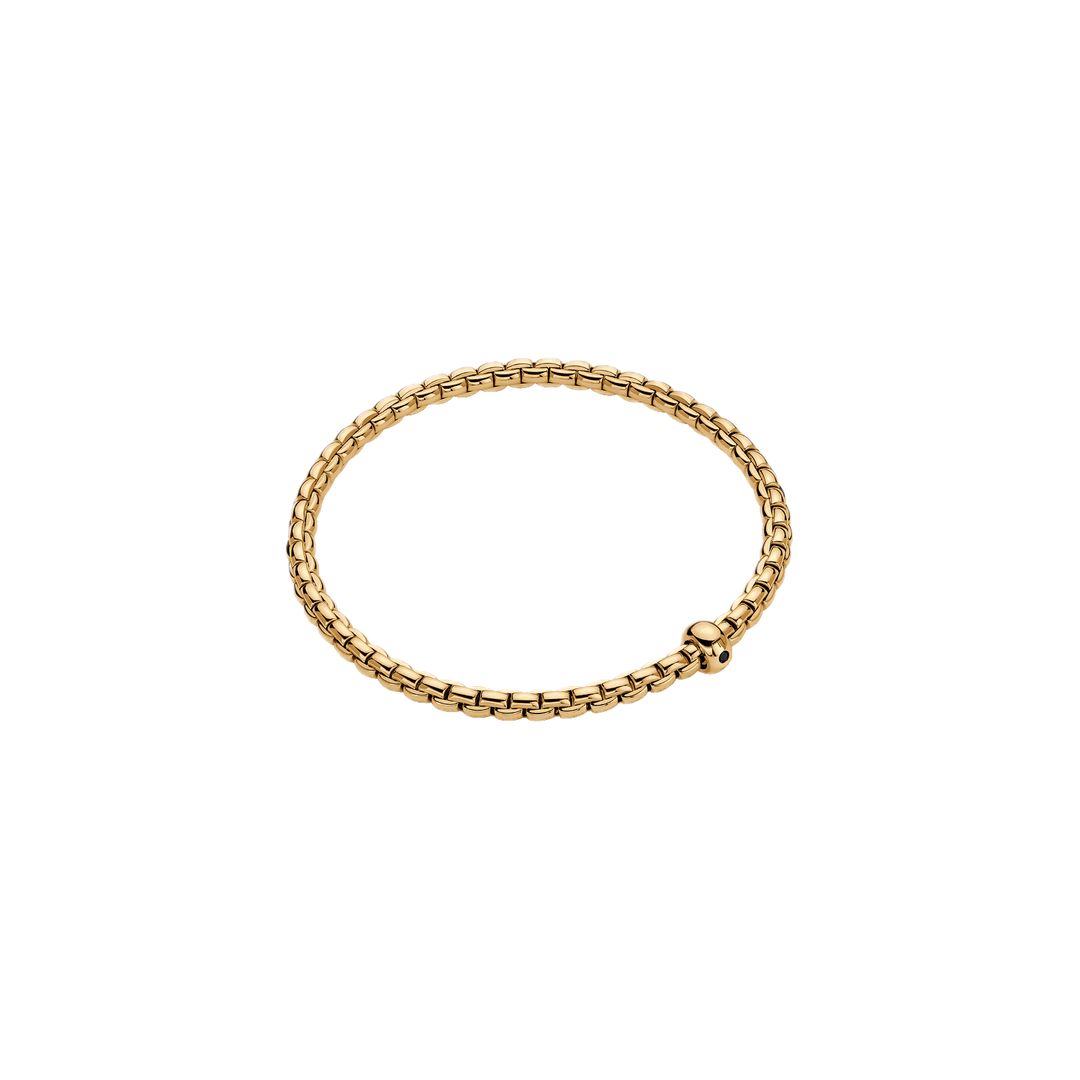 Fope Flex It Eka Armband aus Gold und einer Ronde mit einem schwarzen Diamanten.