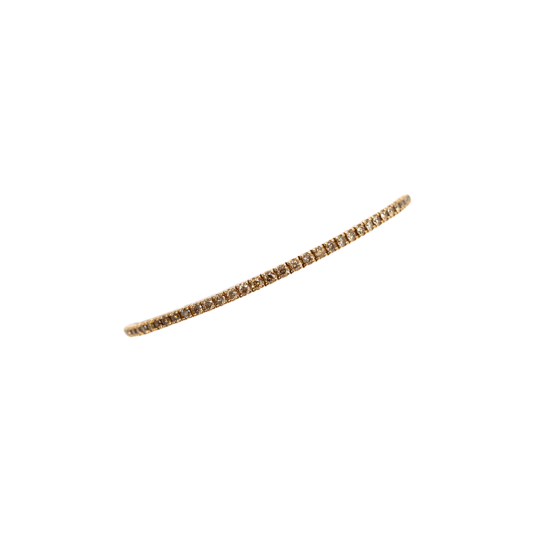 Diamant- , Tennisarmband aus Roségold und braunen Diamanten.